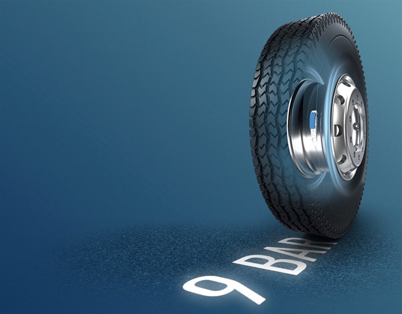 A translucent rubber wheel showing the axle inside rolling over text saying 9 bar