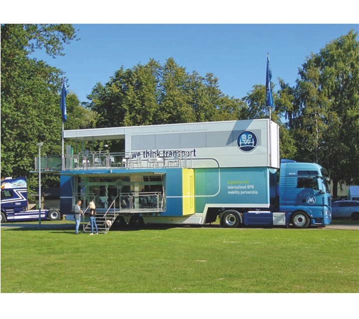 A BPW double decker trailer with a balcony and seating 